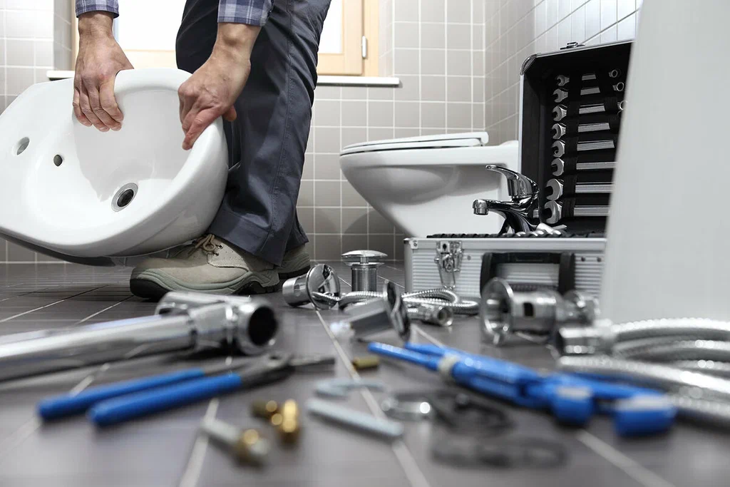 Plumbing tools prepared for a bathroom repair in Harrisburg